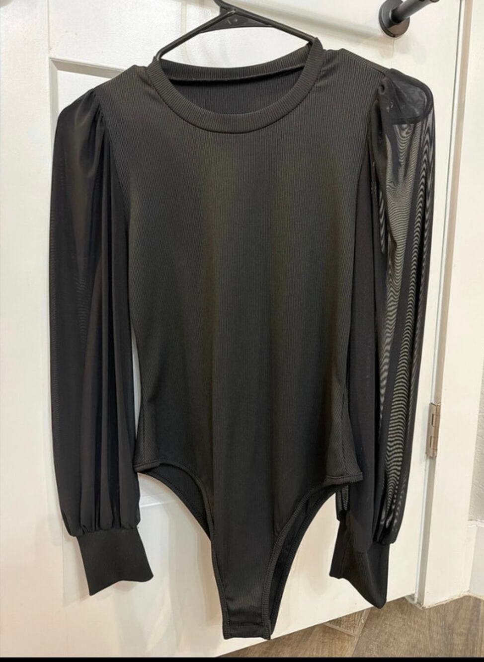 Women’s black bodysuit